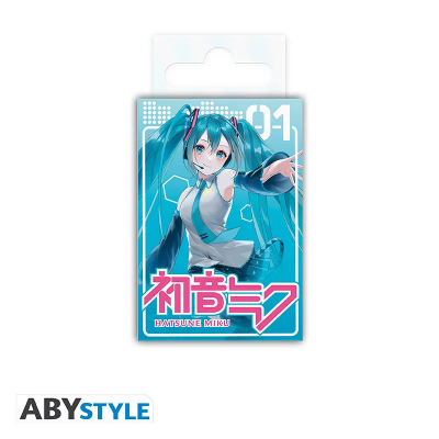 Prostokątny magnes z uśmiechniętą Hatsune Miku puszczającą oczko na turkusowym tle